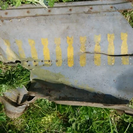 39. A fragment of PV-1 BuNo 48928 with mission marks below the cockpit
