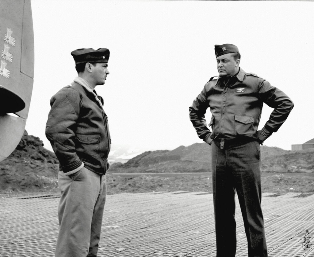 VB-139 CO Lt.Cmdr William R. Stevens and FAW4 CO Cmdr Leslie Gehres by the PV-1 BuNo 33110 with decorated tail. 12 June 1944, Attu