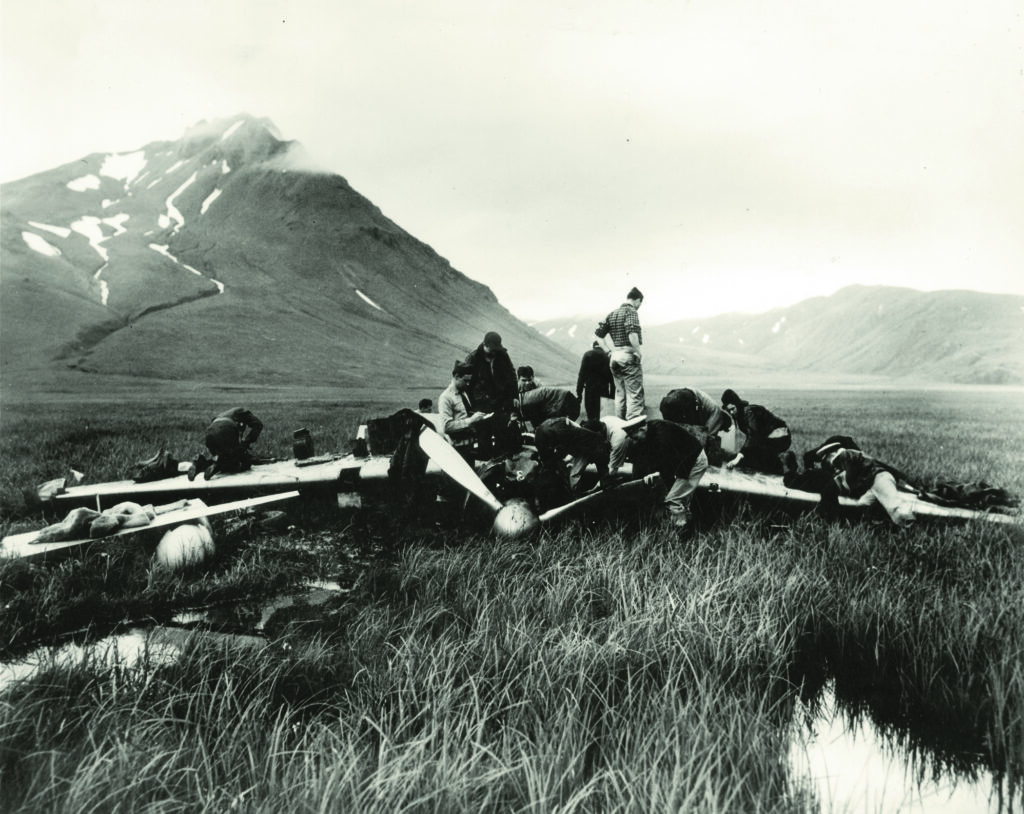 U.S. forces on Akutan Island inspecting the downed Japanese Mitsubishi A6M Zero fighter that was damaged in the Dutch Harbor attack and crash landed on Akutan Island, killing the pilot.