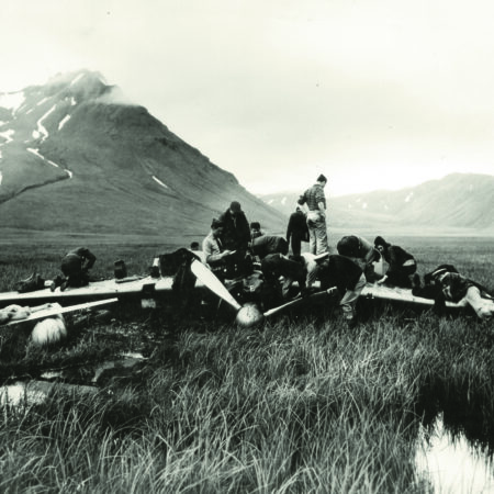 U.S. forces on Akutan Island inspecting the downed Japanese Mitsubishi A6M Zero fighter that was damaged in the Dutch Harbor attack and crash landed on Akutan Island, killing the pilot.